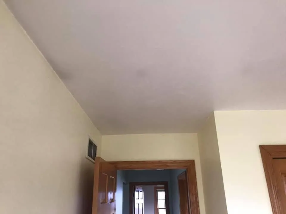 Bedroom ceiling stain wall vent oak door trim