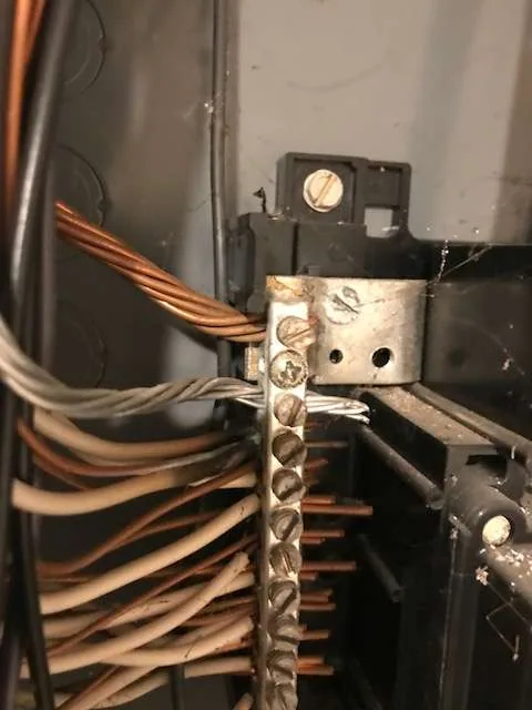 Electrical panel neutral bus bar wiring closeup