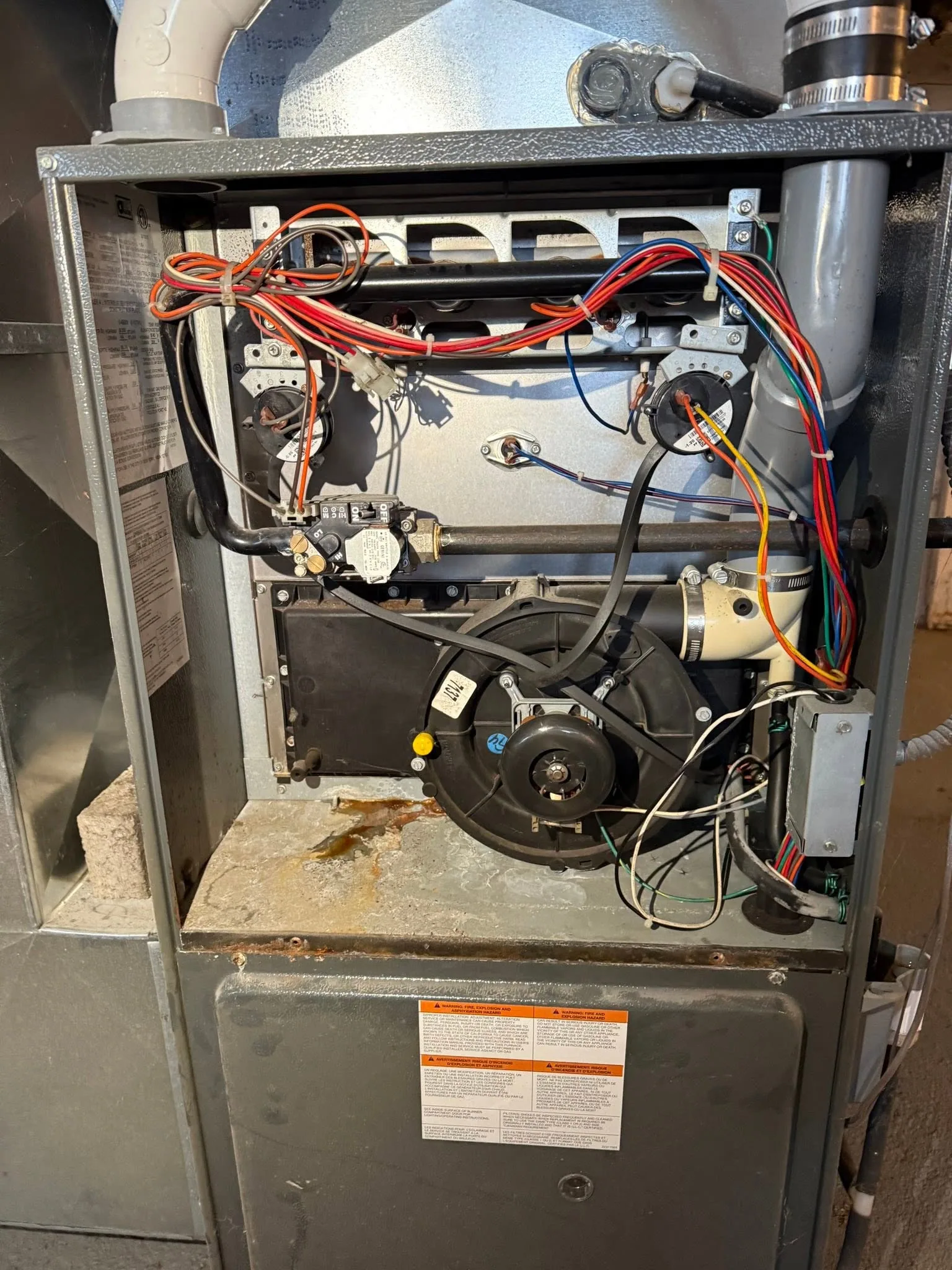 Open gas furnace inducer motor rust streak
