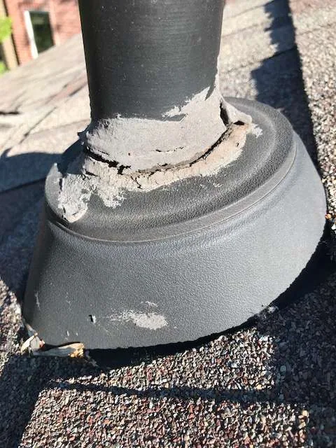 Plumbing vent pipe boot cracked sealant shingle roof