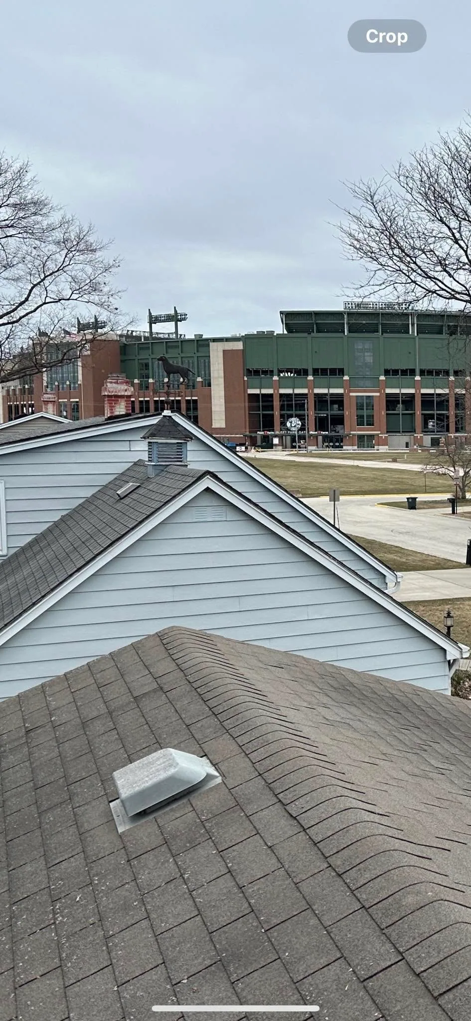 Roof vent asphalt shingles lambeau field view