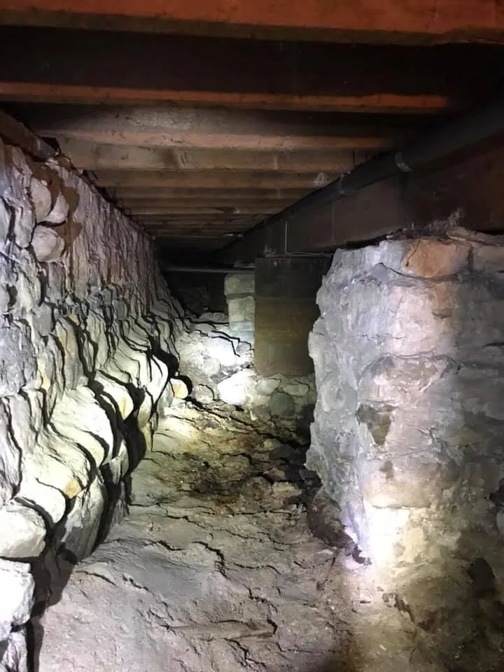 Stone foundation crawlspace dirt floor joists